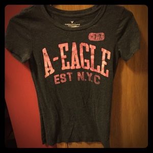 Short sleeve American Eagle shirt.